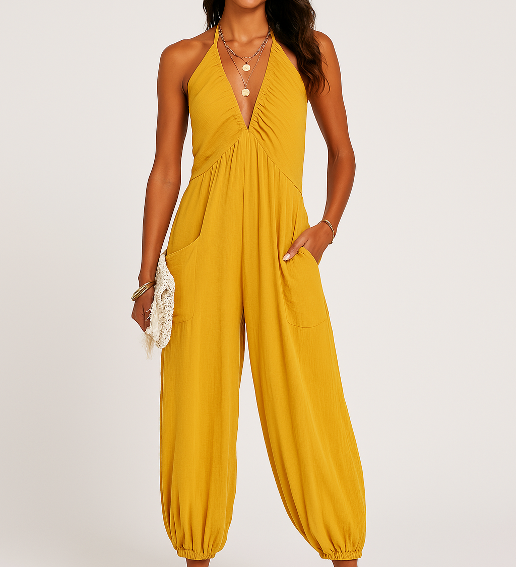 Halterneck dame jumpsuit med dyb udskæring og elastiske ben