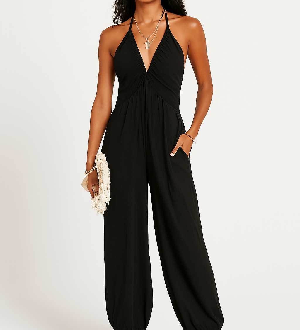 Halterneck dame jumpsuit med dyb udskæring og elastiske ben