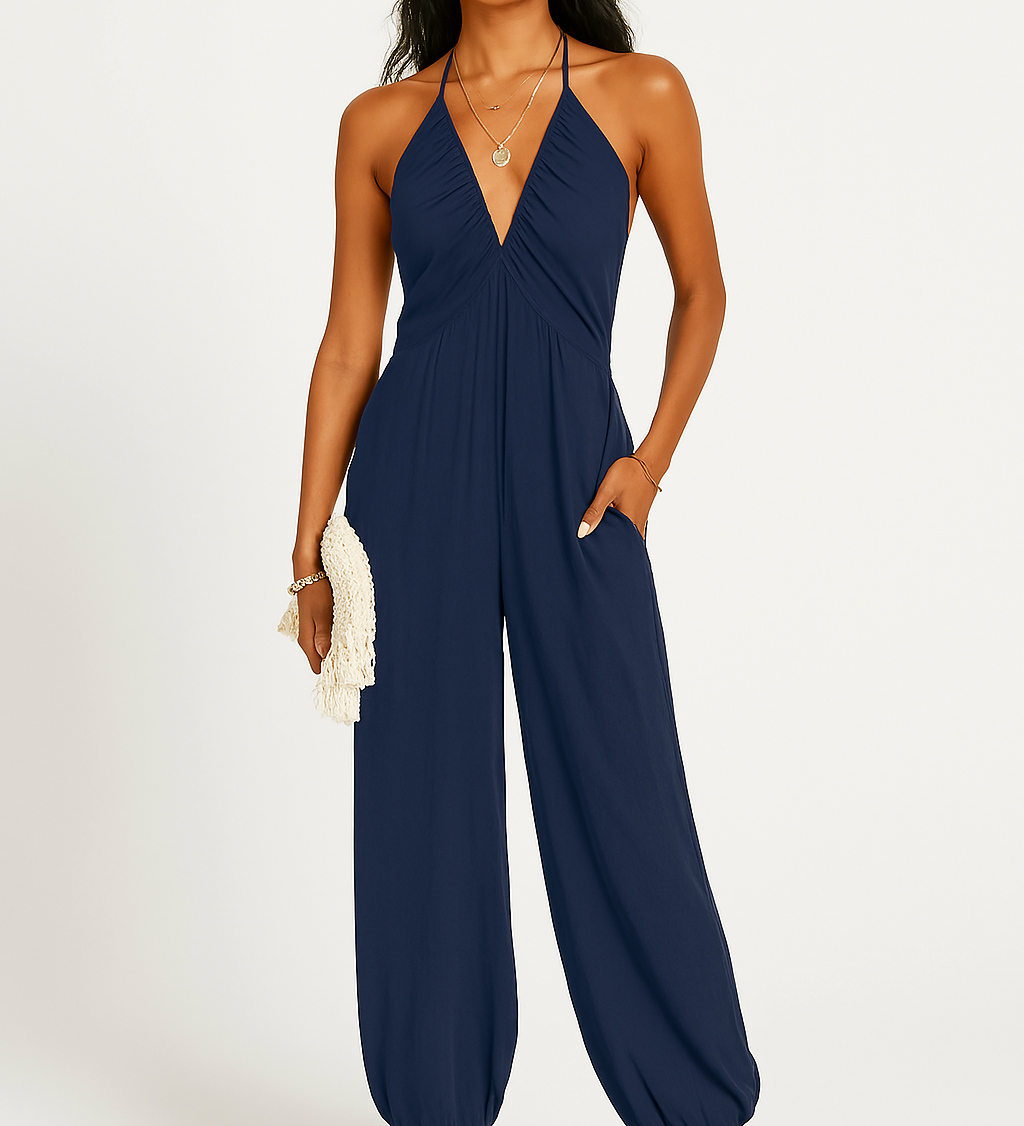 Halterneck dame jumpsuit med dyb udskæring og elastiske ben