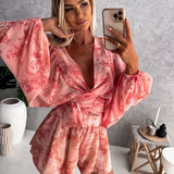 Boheme playsuit med blomsterprint og lange ærmer – perfekt til sommer