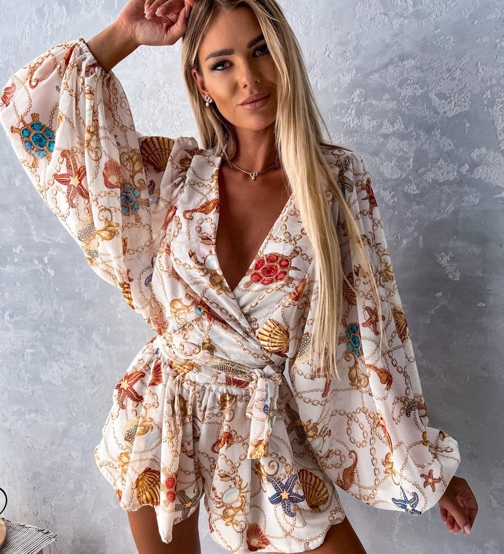 Boheme playsuit med blomsterprint og lange ærmer – perfekt til sommer