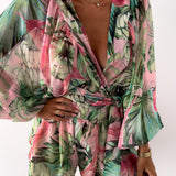 Boheme playsuit med blomsterprint og lange ærmer – perfekt til sommer