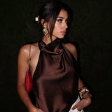 Halterneck top i satinlook med elegant fald