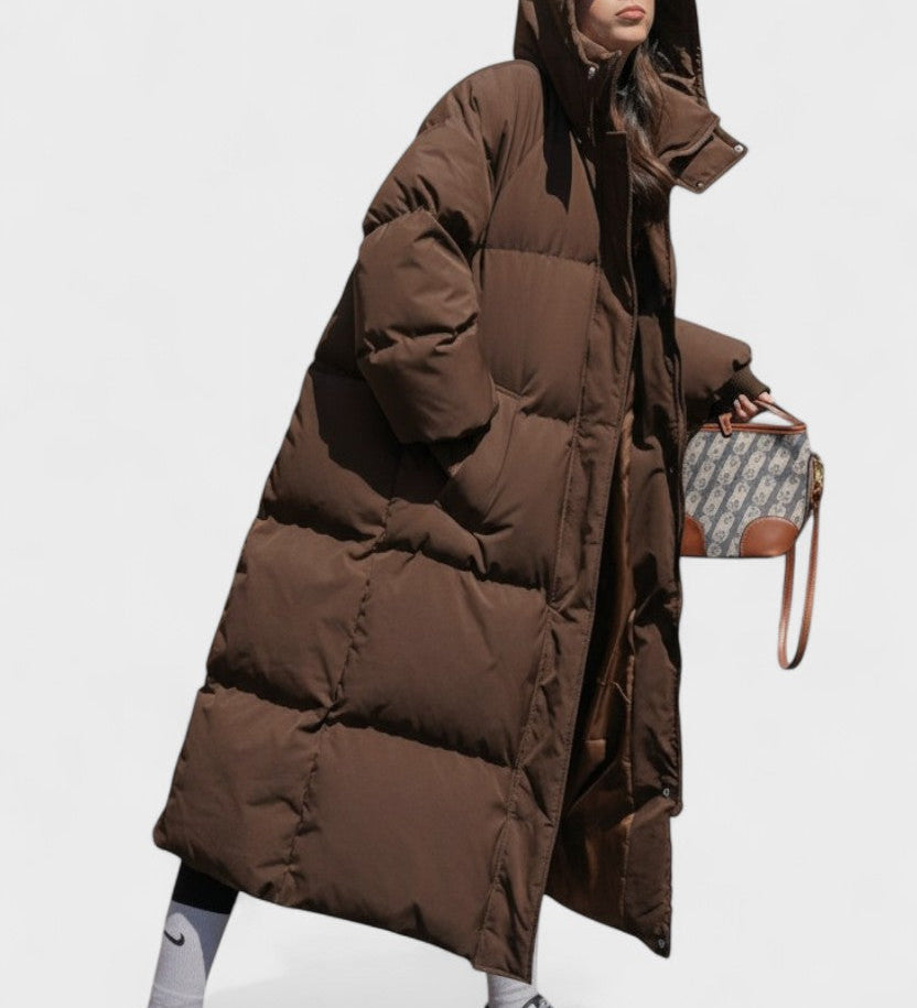 Gabriela™ | Lang pufferjakke med hætte og afslappet pasform – maksimal varme med moderne stil