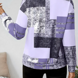 Patchwork Bluse med Lynlås – Moderne og Komfortabel Hverdagsstil