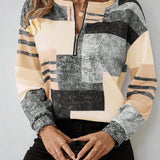 Patchwork Bluse med Lynlås – Moderne og Komfortabel Hverdagsstil