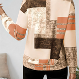 Patchwork Bluse med Lynlås – Moderne og Komfortabel Hverdagsstil