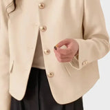 Kort Blazer med Runde Knapper og Elegant Minimalistisk Stil