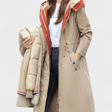 Lang vinterfrakke med hætte og elegant pasform – varm komfort og tidløs stil