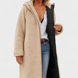 Lang quiltet frakke med teddykrave og afslappet pasform – varm stil til kolde dage