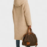 Lang quiltet frakke med teddykrave og afslappet pasform – varm stil til kolde dage