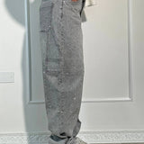 Baggy jeans til kvinder med malerpletter – afslappet stil og kreativt design