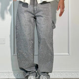 Baggy jeans til kvinder med malerpletter – afslappet stil og kreativt design