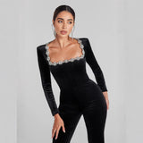 Velour jumpsuit til kvinder med langærmet elegant snit