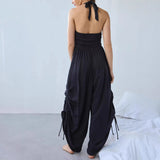 Boheme dame jumpsuit med halterneck og draperede ben