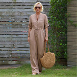 Linned Jumpsuit med Knapper og Justerbar Talje