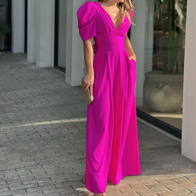 Elegant dame jumpsuit med pufærmer og v-udskæring