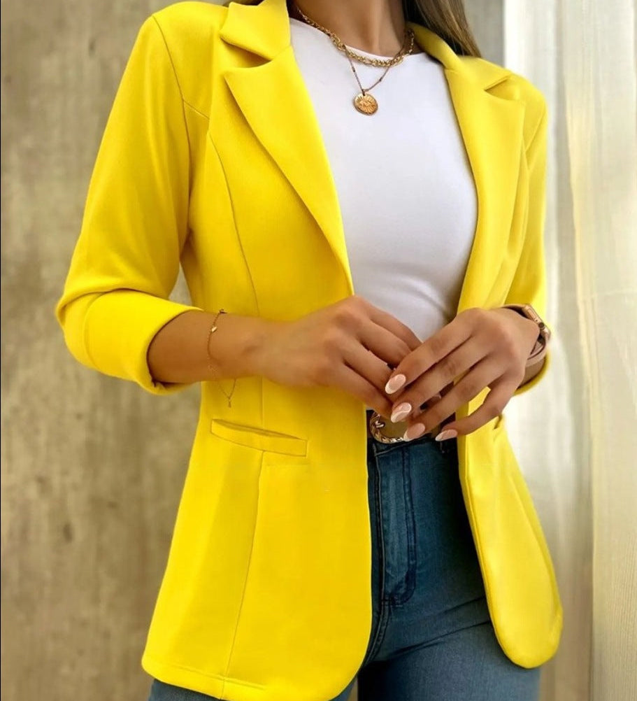 Dame blazer i orange – stilfuld jakke med ¾ ærmer til et moderne look