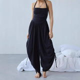 Boheme dame jumpsuit med halterneck og draperede ben