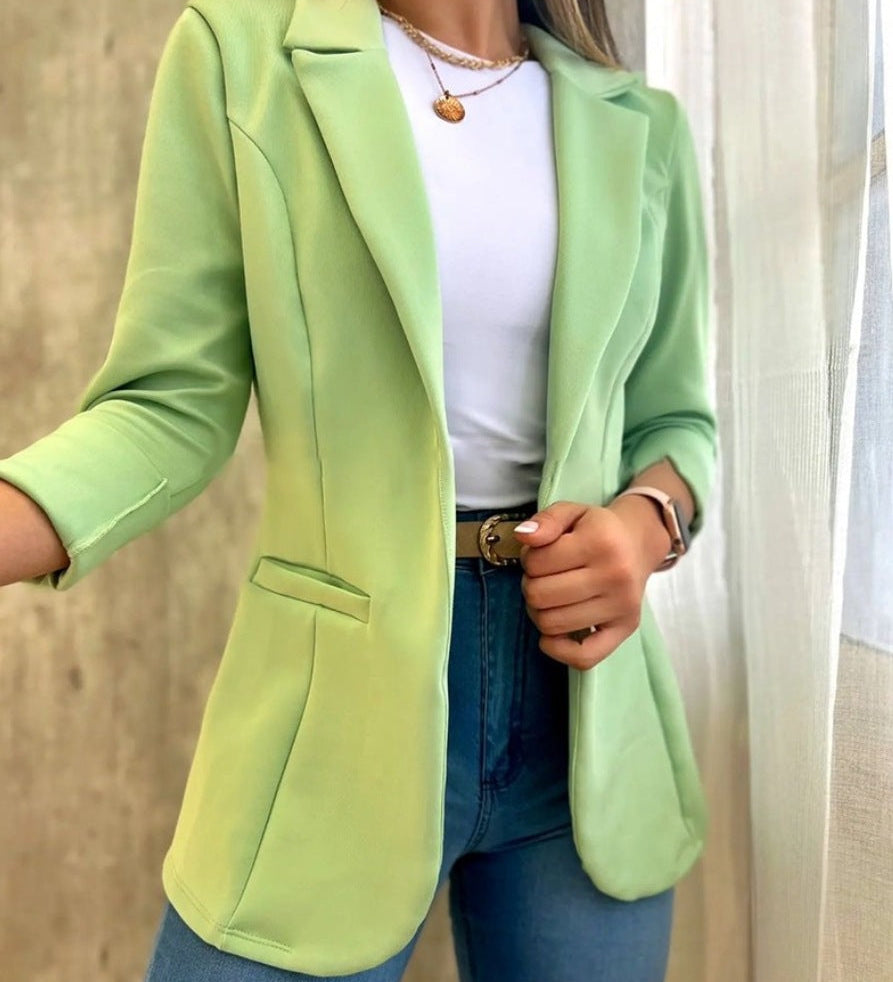 Dame blazer i orange – stilfuld jakke med ¾ ærmer til et moderne look