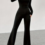 Elegant figursyet jumpsuit med lange ærmer og vide ben