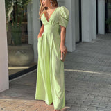 Elegant dame jumpsuit med pufærmer og v-udskæring