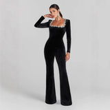Velour jumpsuit til kvinder med langærmet elegant snit