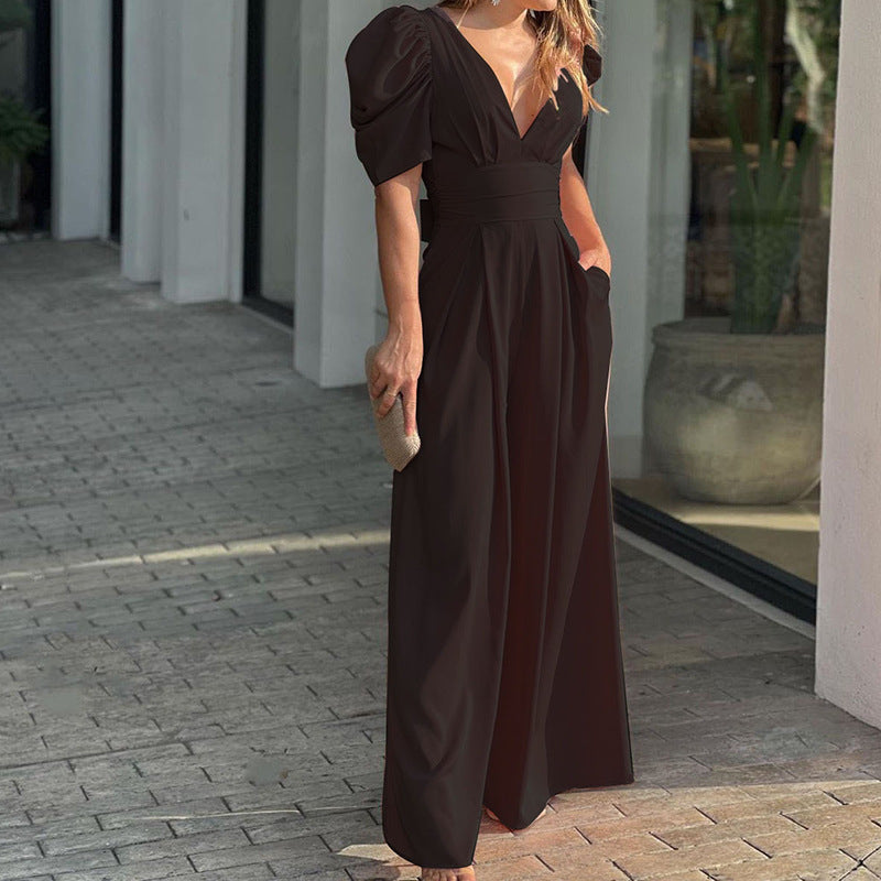 Elegant dame jumpsuit med pufærmer og v-udskæring