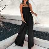 Sommer jumpsuit til kvinder med smock top og brede ben
