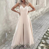 Stilfuld dame jumpsuit med v-udskæring og brede ben