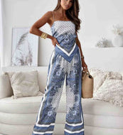 Sort-Hvid Jumpsuit med Grafisk Print og Spaghettistropper