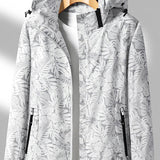 Let outdoor jakke med hætte og vandafvisende komfort