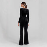 Velour jumpsuit til kvinder med langærmet elegant snit