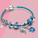 Charm Armbånd med Blå Havtema Perler og Delfin Vedhæng