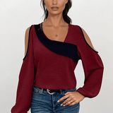 Asymmetrisk bluse med åbne skuldre og moderne snit – feminin stil med kant