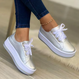 Guld sneakers til kvinder med satinbånd og platformsål