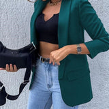 Klassisk sort dameblazer med tidløst design