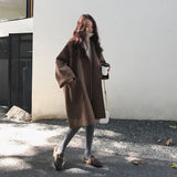 Oversize uldlook damefrakke med 3/4-ærmer og moderne silhuet