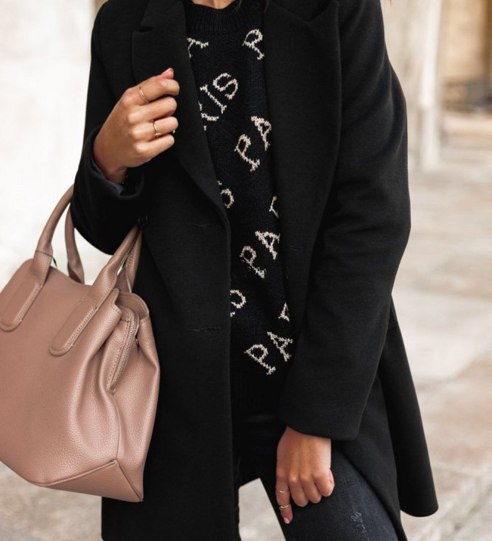 Elegant dobbeltknappet damefrakke med klassisk pasform