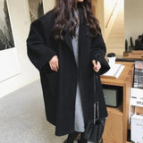 Oversize uldlook damefrakke med 3/4-ærmer og moderne silhuet