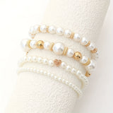 Elegant Perlearmbånd Sæt med Guld- og Elastisk Design
