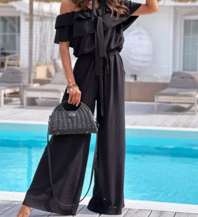 Off-Shoulder Jumpsuit med Flæser og Bindetalje