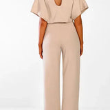Elegant Bindebælte Jumpsuit – Løs Top & Brede Ben