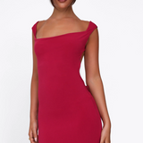 Lang aftenkjole med åben ryg og sløjfe