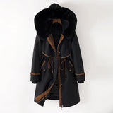 Lang Frakke med Faux Fur Hætte og Elegant Taljesnit