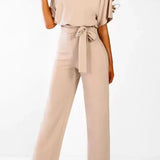Elegant Bindebælte Jumpsuit – Løs Top & Brede Ben