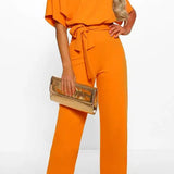 Elegant Bindebælte Jumpsuit – Løs Top & Brede Ben