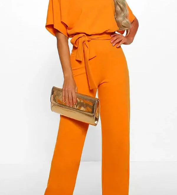 Elegant Bindebælte Jumpsuit – Løs Top & Brede Ben