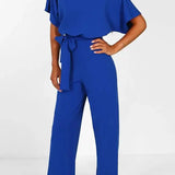 Elegant Bindebælte Jumpsuit – Løs Top & Brede Ben