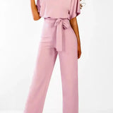 Elegant Bindebælte Jumpsuit – Løs Top & Brede Ben